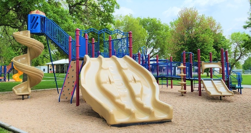 The Atkinson City Park features a large playground area with several slides and other activities.